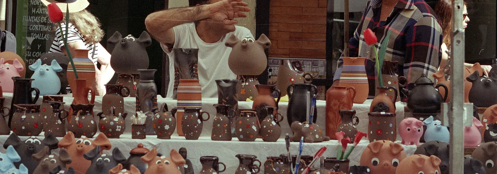 Ceramic money boxes on a stall at El Rastro de Madrid