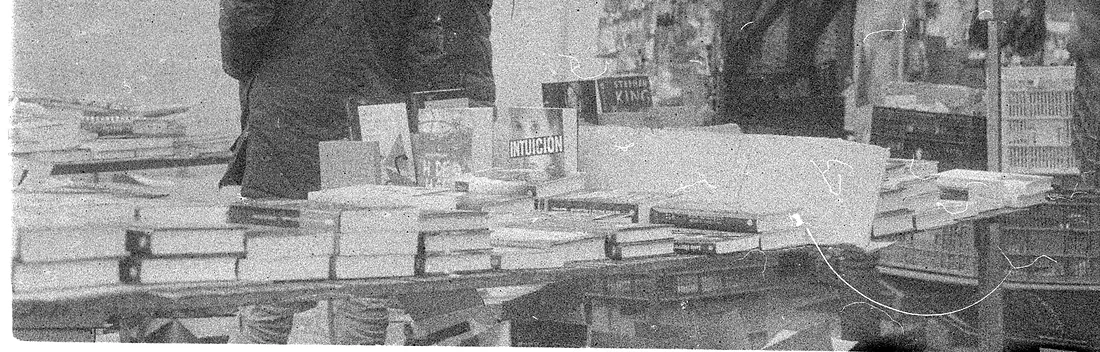 Tables of books on a stall at El Rastro de Madrid